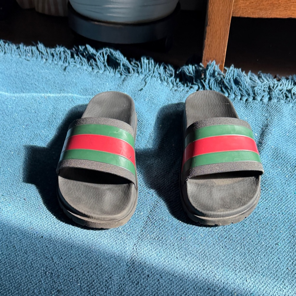 Gucci slides.